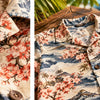 Aloha shirt fabric with a Japanese-inspired red wave and blossom print