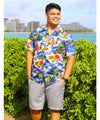 Mode wearing authentic Hawaii Polynesian Aloha Shirt in navy color