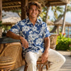 Man wearing a blue floral Hawaiian shirt from Shaka Time Hawaii