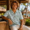 Man wearing a sage floral Hawaiian resort shirt from Shaka Time Hawaii