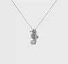 Sterling Silver Freshwater Cultured Pearl and Brilliant-cut CZ Seahorse 18 Inch Necklace
