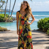 Woman wearing a tropical Hawaiian dress with pineapple pattern standing on a beach path. Shaka time Hawaii